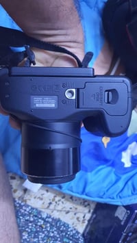 كانون SX60 HS • زوم ٦٥× • مايك خارجي