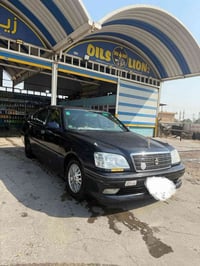 ملكه موديل 2002 مدفوع كمرك وضريبه باقي عالرقم قرصها واصل بكل العراق دك...