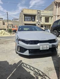 K5 2025 gt line وارد امريكي سمنتي داخل احمر حادث خفيف جدا بدون تبديل  ...