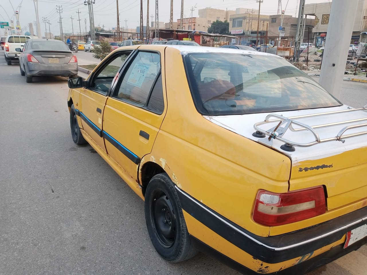 السلام عليكم بيجو 405 رقم بصره الماني بدون راعي بيها وكاله عامه  للبيع موديل 2012 مكينه وكير بيكاجو نضيفات اوتوماتيك السنويه نافذه مكاني الناصريه المركز بيها شويه خياسات بلهلات الوره رقم *********** السعر 17 وبيها  مجال رقم شرعي ضايع
