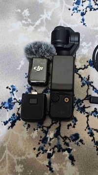 كامرا بوكت ٣  السعر ٤٥٠ الف مع مايك  الجهاز المايك بي ميسجل الخاص بي م...