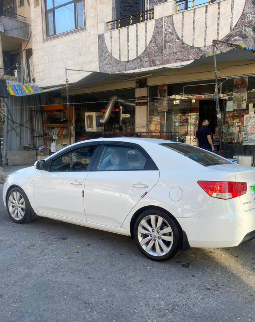 كيا سيراتو ٢٠١٣ خليجي بدون دعم وصبغ وبدون تعديل السيارة وضع شركة مواصفات شفتات ستسرن مرايات شفط واشاير بلمري وتحكمات استيرن جهتين وحساسات شركة كير ومحرك تبريد شرط  ***********.  *********** دهوك, العراق
