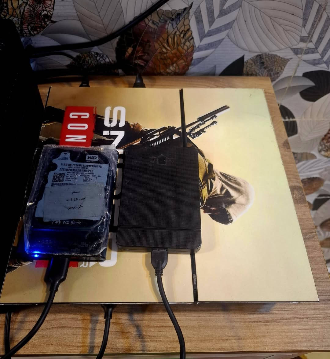 السلام عليكم شباب بلي فور فات جهاز نظيف كارتونه وياه  للبيع ذاكره الداخليه 500G مهكر نظام هاردات يعني تهكير خارجي وتكدر تشغله اقراص واولاين وياه هاردات ثنين كل هارد 500G حجمه وبيه 19 لعبه كلهن شغالات ولعباات قويه وياه UPS 850V  وياه يدات ثنين وكيبل شحن مالتهن وياه واير HD  وكيبل  بور و توصيل عندي شركة بس فلوس التوصيل عليك
مكاني كربلاء وهذا رقمي *********** 
السعر 225  💜
