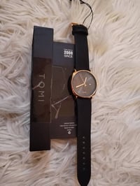 تومي • ساعة