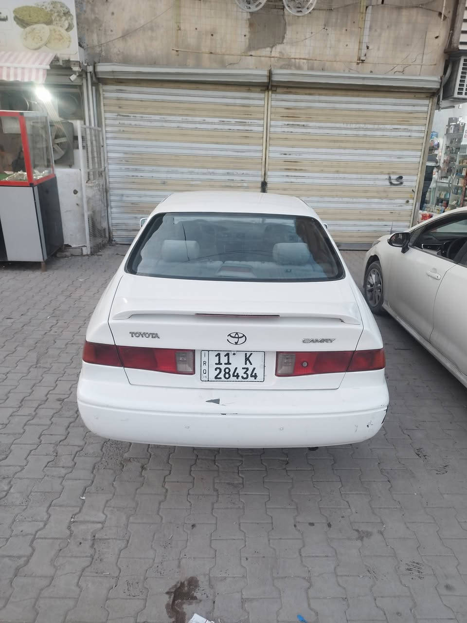 السلام عليكم كامري موديل 2001 رقم بغداد انكليزي محرك 6 تتفئه تبريد كشنات كهرباء وارد  منضومه غاز شاديلها يعني غاز بانزين مصبوغه عام*********** السعر 64
