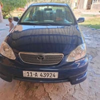 كورلا 2007 وارد امريكي مبدل باب  صبغ عام  كير +محرك100% صدر امامي خلفي...