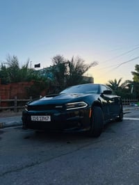 جارجر موديل ٢٠٢٢ اصل  فئة sxt ماشية ٦٢ الف  السيارة بااسمي تحويل ثاني ...