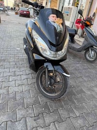 دراجة PCX الجيل الثاني • دراجة PCX • دراجة مكفولة • محرك مكفول • سكوتر...