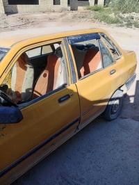 عندي سيايبه موديل 12 رقم احمر نيسان كوم حديد مكان بغداد بسمايا رقم 077...