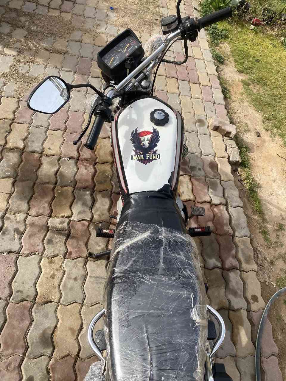 دراجه ايراني للبيع موديل 2021اوراق منفيس فقط كهربائيات كله شغاله السعر 500وبي مجال للشراي  للستفسار  *********** مكان الرمادي جزيرة البذياب
