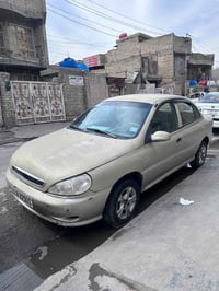 عندي كيه ريو 2001 خصوصي بسمي رقم دولي بغداد كير عادي رايدهه 35 هذا رقم...