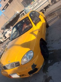 دايو لانوس موديل ٢٠٠١ رقم كركوك سنويه عظم عاج دفتر بانزبن موجود محرك ١...