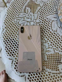 ايفون اكس ماكس ذهبي التلفون نضيف  فقط بي ضربه بالضهر مثل مموضح بالصور ...