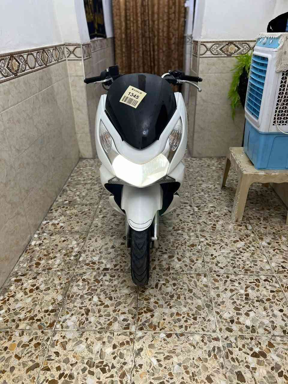 دراجه pCX جديده مال رمبه ياباني نوزل خطين ستان كهربائي مكينه ناعمه شلعه معدل كفرات اصليه كهربائياتها كلها شغاله مكينه 150 لمرخوب دراجمه جديده مكفوله اي نقص مابيها السعر مليون 400 الف العنوان بغداد الكرخ رقم ***********
