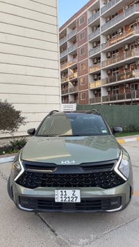 🚗 Kia Sportage 2023 X-Line – فول مواصفات لون زيتوني مميز 💚 ممشى 51,800...