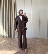 سوت قطعتين • مقاسات ٣٦-٤٨ • ٤ ألوان