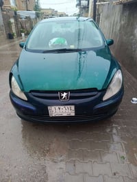 بيجو 307/2005 للبيع رقم نجف مشروع وطني/  مكينه وكير كورلا السعر/ 28 / ...