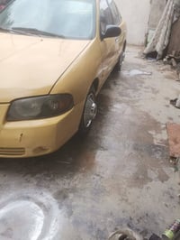 من رحصت الدمن سياره نيسان 2005 مصفره هياه للبيع 07831025592 السعر 40 ا...