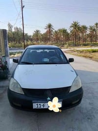 لانسر موديل 2009بأسمي مابيها قطرة صبغ بلادية فقط بنيد مبدل (كير عادي) ...