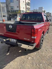 نيسان • تايتان • فيسبوك