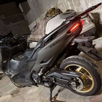 Tmax 2021 560 23.000k دراجة مال مزاد ومماشيه بشارع  جديده بمعنى الكلمة...