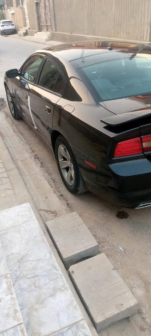 جارجر ٢٠١١ كفاله ماعدا باب الامامي جهة العبري رقم اربيل انكليزي لل٢٠٢٧ لون اسود ***********$$$سعره ١٤٠ بيه مجال
