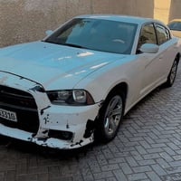 جارجر موديل 2013 للبيع ابيض اللون بدون حادث بدون ايرباك فقط جامله جهة ...