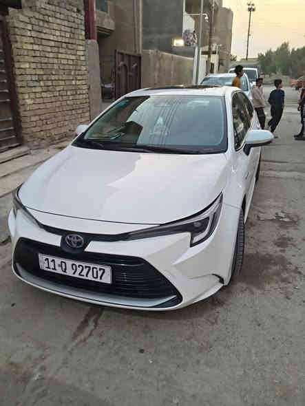 كورله هايبرد 2024 ماشيه 23 مكفوله بس مكانات بارد ***********  بغداد سعر 145
