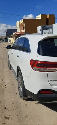 كيا سيرنتو 2015 – أبيض – رقم أربيل 🚗 محرك 4 سلندر 🌞 فتحة بانوراما 🔝 فو...