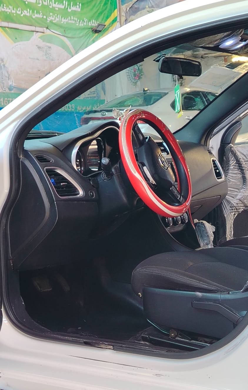 السلام عليكم.. للبيع سيارة دوج أفنجر موديل 2014، سيارة بيتية ونظيفة جداً، البيع لظرف  مستعجل والسعر (قفل).
​المواصفات:
​المحرك: 2400 CC، بحالة ممتازة جداً ونظافة عالية.
​الجير (الكير): جديد ومكفول، تبديلاته ناعمة جداً.
​الرقم: كربلاء، السنوية مجددة لغاية 2028 والتحويل مباشر (باسم شخصي).
​الممشى: 163 ألف ميل  (حقيقي).
​الحدادية: الأمامية جديدة بالكامل (نفض).
​الداخلية: الغرفة نظيفة جداً وبحالة الوكالة.
​حالة البدي (الهيكل):
​حادث جاملغ وبنيد (بدون دواخل نهائياً)، السيارة مكفولة من الداخل.
​مصبوغة 3 قطع فقط .
​النواقص (للأمانة):
​تحتاج كمبريسر تبريد.
​تحتاج شغل بسيط بالحدادية الخلفية.
(تم مراعاة هذه النواقص في السعر ليكون المشتري مستفيداً).
​السعر: 8,800$ (88 ورقة) - السعر نهائي وقفل لسرعة البيع.
​المكان: كربلاء المقدسة.
للتواصل والاستفسار: (*********** )
