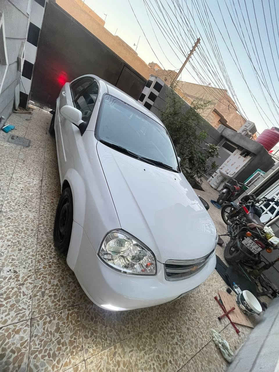 أوبترا 2005سياره نضيفه استخدام شخصي مكينه كير حلوات بيها رشات صبغ ماشيه 200000الف كير اوتو السعر 62وبيها مجال  ***********.   رقمها كربلاء مميز
