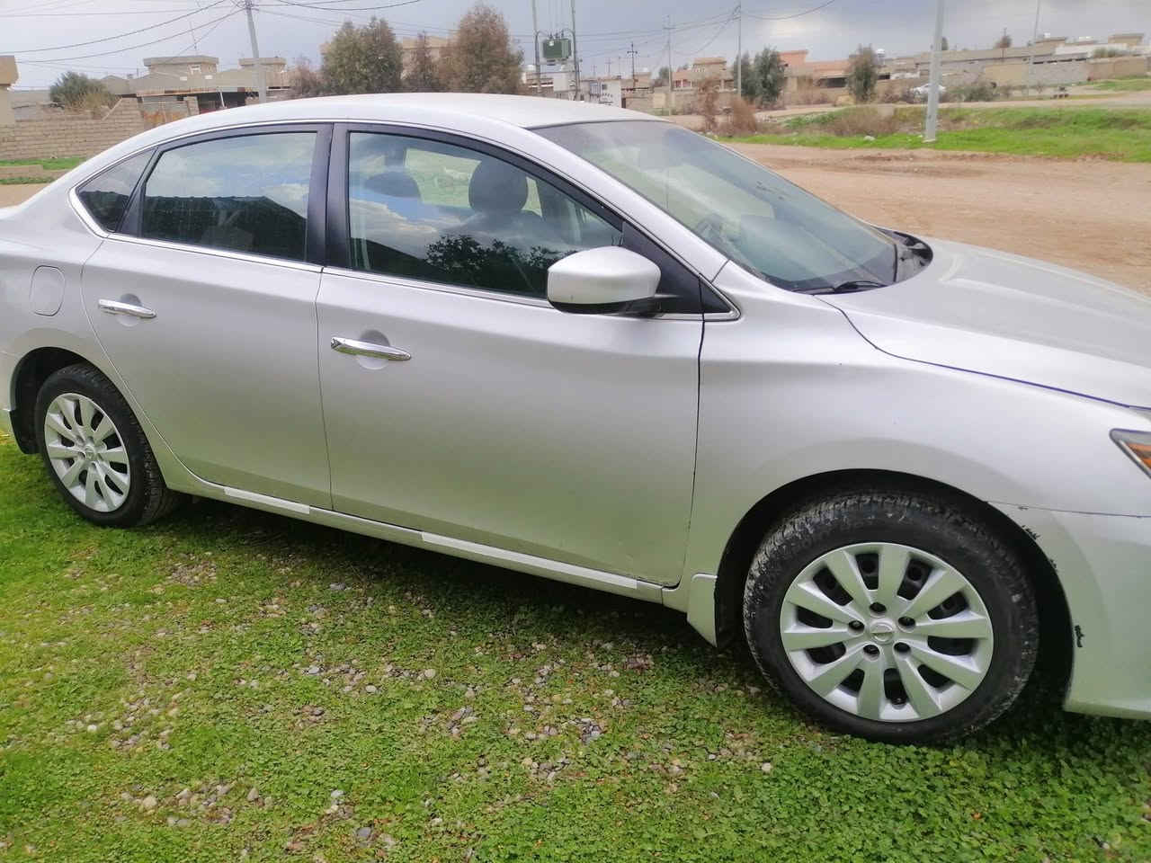 نیسان سینترا 2017 رقم نينوي باسمي شرط التحويل حادث السيارة جاملغ امامي سكن فقط بارشود استيرن والدشبول والسعر ١١٣ رقم التلفون ***********
