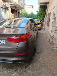 كيا اوبتيما موديل 2015 خليجي محرك 2000 بيها قطعتين صبغ باب خلفي وجاملغ...