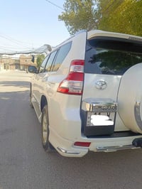 للبيع برادو موديل ٢٠١٤ TXl ٤ سلندر    رقم بغداد الجديد و بأسمي   سبير ...