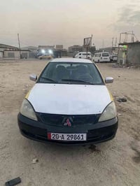 لانسر للبيع 2009 رقم إنكليزي مصفرة هيئة غرامات تبريد تدفئة السيارة خير...