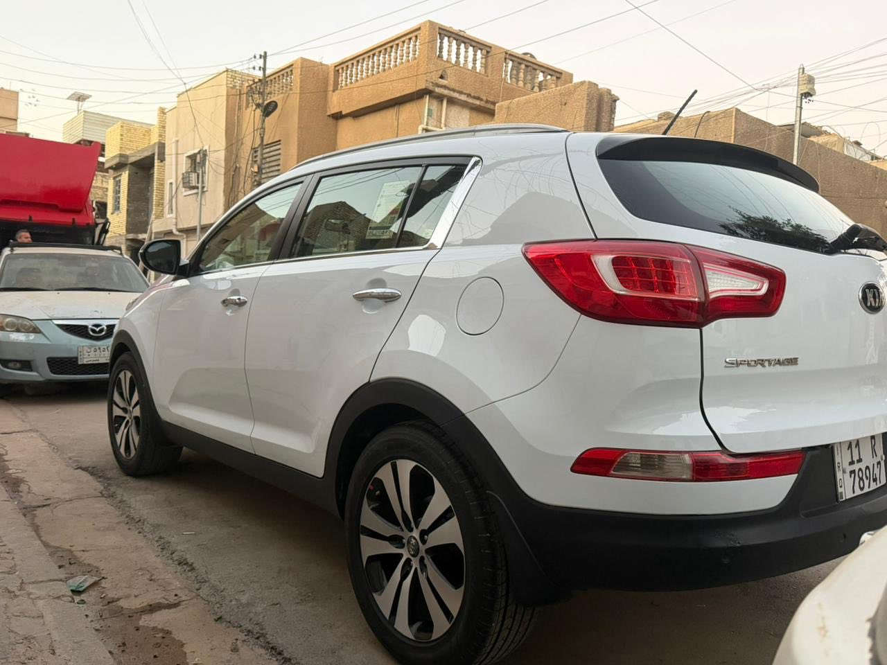 السلام عليكم كيا سبورتج 2014 مكفوله خليجي سياره جديده كلش بيه طخه بسيطه مبينه بصوره ع وضعه ممصلحه / رقم بغدا هزه وفحص ورقم وسنويه كله جديد مواصفات / مكينه 2000 دوش / مرايت شفط/ يده نيكل/ شاشه تاب / كامره خلفيه/ ويل كب فراشه / ماشيه 159 كيلو / مكاني بغداد الامين السع. 153 وبيه مجال  0771 003 1938
