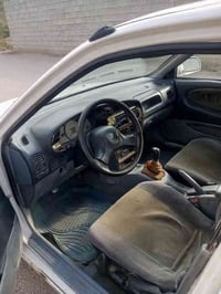 بروتون • ٢٠٠٢ • مكفولة