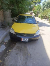لانسر 2008 • وارد امريكي • كفاله سنة