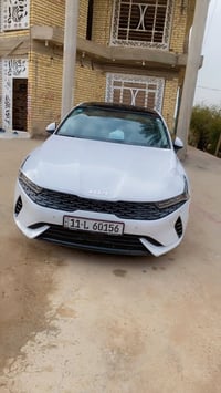 كيا K5 2023 Ex full 1/1 رقم بغداد معوقين بأسم والدي   اعلى مواصفات بال...