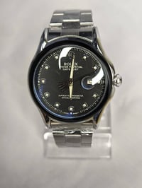 رولكس • مكينة كوارتز • جام زفير