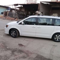 دوج كرفان 2011 رقم كربلاء دولي وباسمي لون ابيض فول مواصفات حادثها الجا...