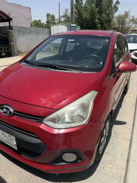 Hyundai grand i10 موديل 2015 مكفولة من الصبغ والفتح شاشة كبيرة مع خاصي...