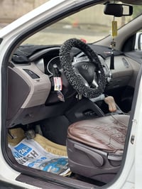 سيارة توكسن 2012  كير محرك شرط تدفئة تبرد سنويه شرط التحويل وبيها كابو...