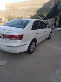 سوناته ٢٠٠٩ رقم بغداد الجديد بأسمي محرك ٢٤٠٠ السياره بعد احلى من الصور...