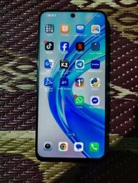 جهاز هونر X7b نضيف علئ وضع الشركة ذاكره 256بطاريه 6000 كامل الملحقات س...