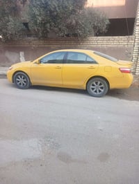 كامري 2009 وارد امريكي  LE مكاني بغداد الدوره السياره بسمي  مصفر هيأ  ...