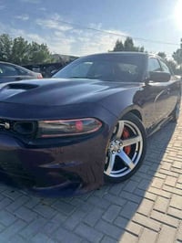 دوج جارجر سكات للبيع فقط موديل 2021 لون بنفسجي   محرك 6400 / V8  ماشيه...