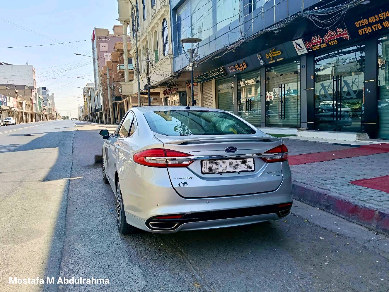 ## 🔥 فورد فيوجن ٢٠١٧ (Ford Fusion 2017) 🔥 سيارة نظيفة جداً، ما شاء الله جاهزة للاستخدام
### 📌 أهم المواصفات والمعلومات:
* **الموديل:** 2017
* **الفئة (المواصفات):** Titanium (فول الفول)
* **المحرك:** 2.0 تيربو (المحرك المرغوب والقوي جداً)
* **ناقل الحركة (الغير):** ماوس (الشكل الجديد)
* **وضعية القيادة:** تحتوي على وضعية **S (Sport)** لقيادة أسرع وأكثر قوة
* **النظام الصوتي:** مجهزة بـ **12 سماعة من براند Sony الشهير** (صوت نقي وقوي جداً خاص بمواصفات التايتانيوم)
* **الشاشة:** شاشة كبيرة أصلية (شاشة لمس مع نظام ذكي)
* **الكراسي:** تدفئة كراسي + كراسي جلد كهربائية
* **الصبغ:** 5 قطع صبغ (بدون أي مشاكل في الدواخل أو الشاصي)
* **مواصفات التايتانيوم الأخرى:**
   * تشغيل بصمة وعن بُعد
   * لايتات أمامية LED مع كشافات ضباب
   * حساسات خلفية مع كاميرا دوارة
   * مرايا جانبية كهربائية مع عدسة
   * ويل كروم كبير ومميز
### 📞 لمعرفة السعر ولمزيد من المعلومات:
يرجى الاتصال على الأرقام التالية أو التواصل عبر **الواتساب**:
👉 ***************
👉 ***************