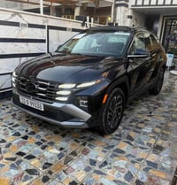 توسان 2025 مرقم بغداد فول مواصفات ١/١ هايبرد بانزين لون نيلي ميتاليك ب...