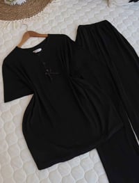 تراك نسائي • أسود • مقاسات L-3XL